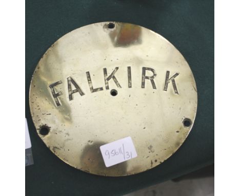 ENGINE PLATE - FALKIRK a brass circular engine plate with 4 pierced holes, and marked Falkirk. 21.5cms diameter