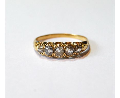 Victorian diamond five-stone half hoop ring, old-cut brilliants, in gold, size Q.CONDITION REPORT: One or two typical 'cleava