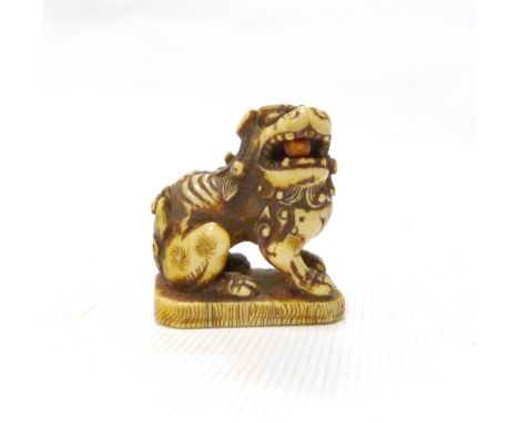 19th century Japanese carved ivory netsuke of a Dog of Fo, 3.5cm. 