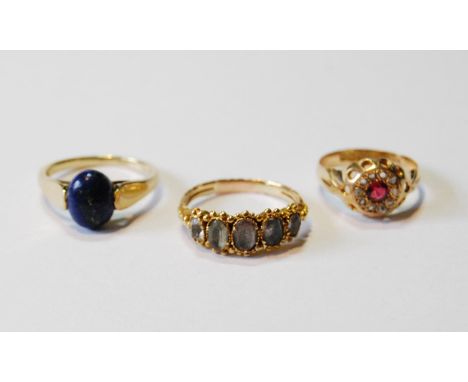 Victorian foiled beryl five-stone ring, a synthetic ruby cluster ring, 18ct, 1911, and another with lapis lazuli, all 9ct gol