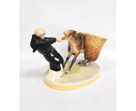 Late 19th century Royal Crown Derby flower vase modelled as a monk pulling against a mule, 28cm wide and 17cm high.CONDITION 