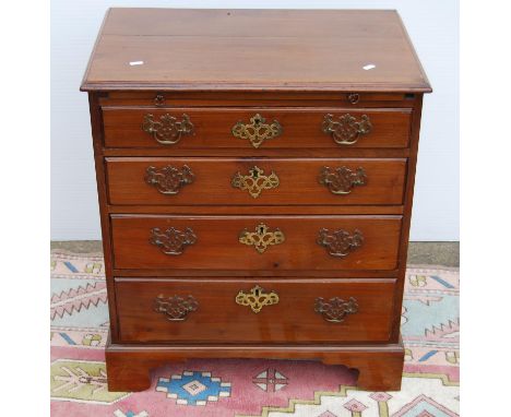 George III style mahogany bachelor's chest, the moulded rectangular top over brushing slide and four graduated long drawers, 
