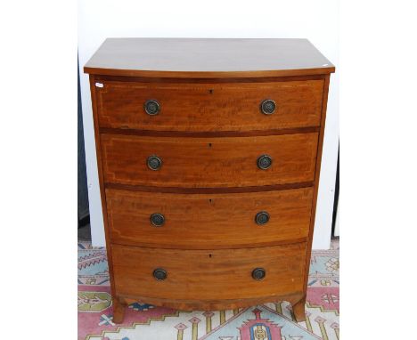 Edwardian mahogany bowfront chest, the boxwood strung top over four graduated long drawers, on splayed bracket feet, 82cm wid