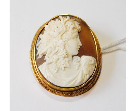 Victorian cameo brooch with oval portrait of a woman, probably 15ct gold.CONDITION REPORT: This is 53mm x 44.5mm. 