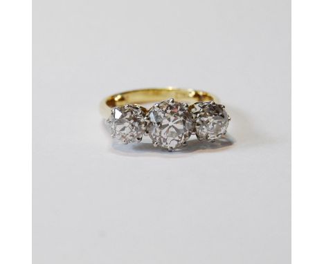 Diamond three-stone ring with old-cut brilliants, approximately 1.5ct and .75ct, '18ct plat', size K½.CONDITION REPORT: One o