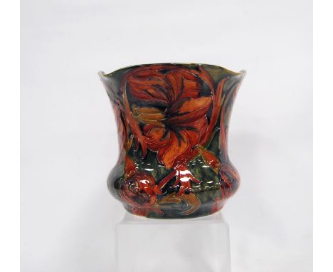 Mid-20th century William Moorcroft jardinière of flared baluster form with floral decoration over green ground, signed to the