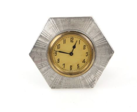 Silver hexagonal form clock with sunburst engine turned finish by A L D, Birmingham 1929