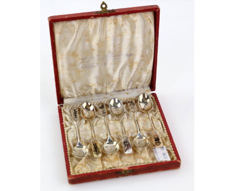 Cased set of six silver and enamel Danish silver spoons by W &amp; S Soerensen with a variety  of enamel pictures/scenes 