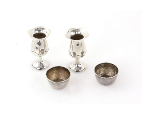 Two pairs of Oriental silver saki/drinking cups