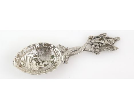 Dutch silver caddy spoon with entwined silver serpent fish handle with figure 