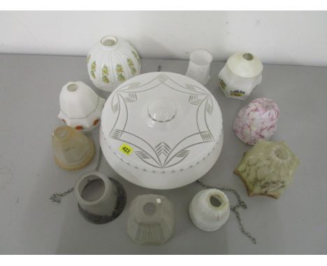 An early 20th century continental opal overlaid and cut ceiling shade, along with a selection of 1930s glass lamp shades 