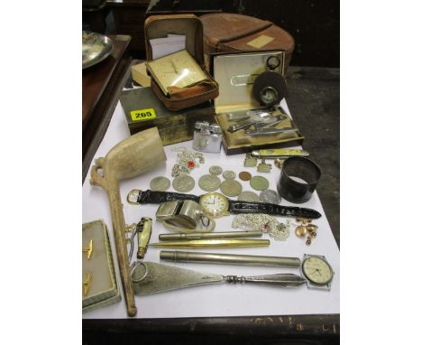 A clay pipe, mixed coins and pens, two watches, a lighter and other items 