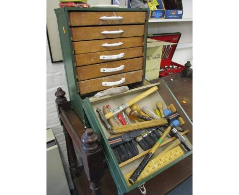 A vintage engineers chest of tools painted green with contents, together with a Bosch electronic air gun 