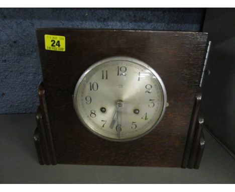 An Anvil, Perivale, London Art Deco cased mantle clock, striking on a gong, with pendulum and key 