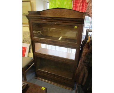 An early 20th century oak three-tier glazed Globe Wernicke style bookcase, 58"h x 34 3/4"w 