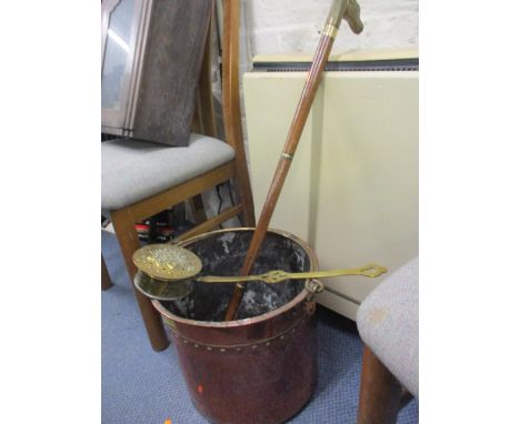 A copper coal bucket, a walking stick and a warming pan 
