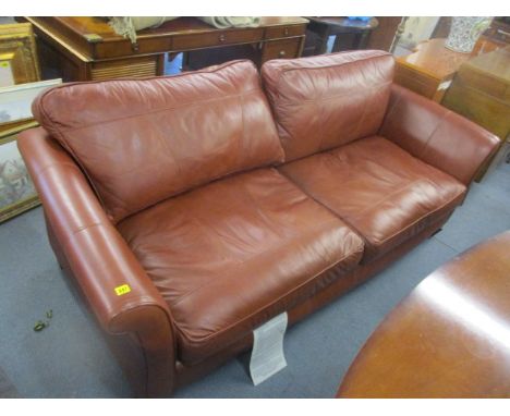 A large brown leather sofa 
