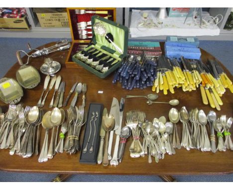 A large quantity of silver plated cutlery to include boxed cutlery, a manual whisk and other items 