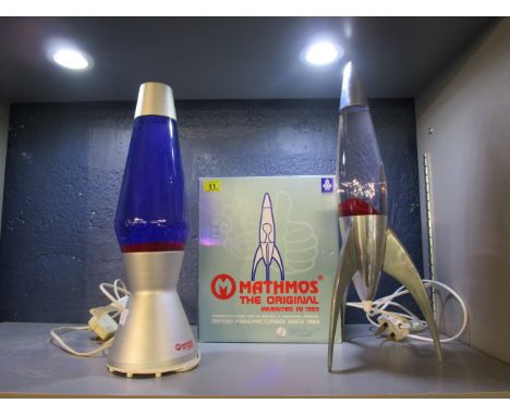 A boxed Mathmos, the original Telstar lava lamp and one other 