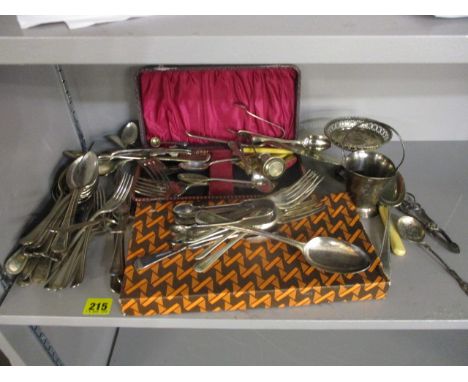 Silver plate to include cutlery and flatware, a sugar basin, sugar tongs and other items 