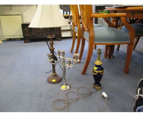 A mixed lot to include a candelabra, a wooden carved lamp and a ceramic table lamp 