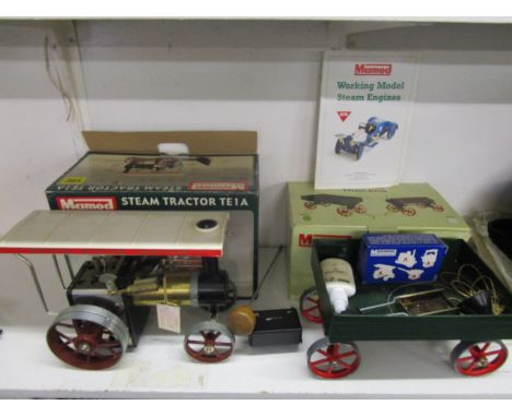 A Mamod steam engine tractor TEIA and trailer with accessories and paperwork, boxed 