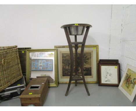 A mixed lot to include a wicker basket, a planter on stand, prints, a till and a lamp 