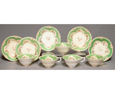 A SET OF FIVE ROCKINGHAM TEACUPS AND SAUCERS, C1830-42, OF THREE SPUR HANDLE SHAPE, DECORATED IN AN APPLE GREEN AND GILT SET 