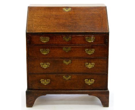 A GEORGE III OAK BUREAU ON BRACKET FEET, 104CM H; 86 X 46CM Side panel split, top surface marked, door slightly warped, all c