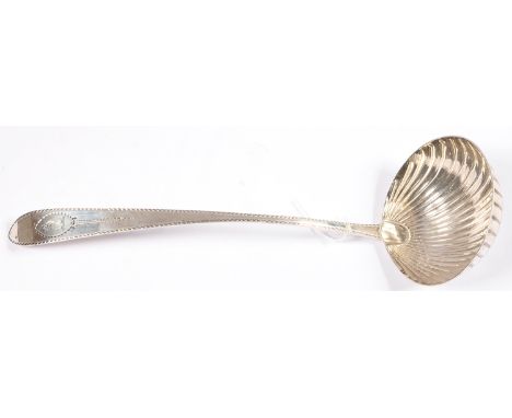 AN IRISH GEORGE III SILVER SOUP LADLE, OF BRIGHT CUT IRISH POINTED OLD ENGLISH PATTERN WITH SHELL&nbsp;&nbsp;BOWL, CRESTED, B