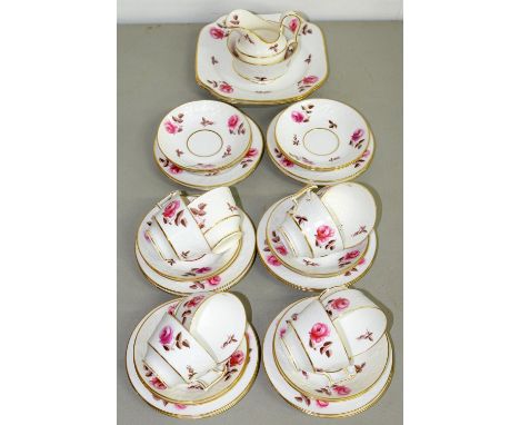 A COPELAND MOULDED BONE CHINA TEA SERVICE, C1930, PRINTED AND PAINTED WITH FULL BLOWN CABBAGE ROSES AND GILT, PRINTED MARK AN