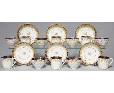 A CHAMBERLAIN WORCESTER SPIRALLY FLUTED BLUE AND GILT TEA AND COFFEE SERVICE, C1798-1800, COMPRISING SIX TRIOS, SAUCER 14CM D