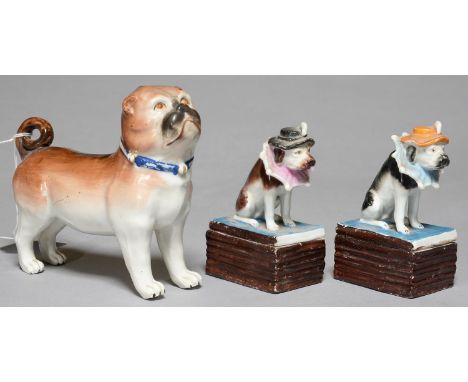 A CONTINENTAL PORCELAIN MODEL OF A PUG DOG, LATE 19TH C, IN A BLUE COLLAR WITH GILT BELLS, 12CM H AND A PAIR OF 19TH C GERMAN