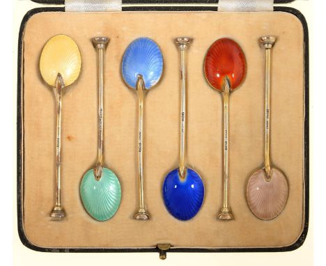 A SET OF SIX EDWARD VIII SILVER GILT AND HARLEQUIN GUILLOCHE ENAMEL COFFEE SPOONS, SEAL TERMINAL, BY H C DAVIS, BIRMINGHAM 19