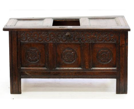 A 17TH C PANELLED OAK CHEST, CARVED AT A LATER DATE, 58CM H; 108 X 46CM Central panel on lid a later replacement and detached
