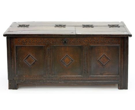 A CARVED AND PANELLED OAK CHEST, LATE 17TH / EARLY 18TH C, THE LATER LID WITH IRON SERPENT HINGES, 61CM H; 30 X 56CM Old repa