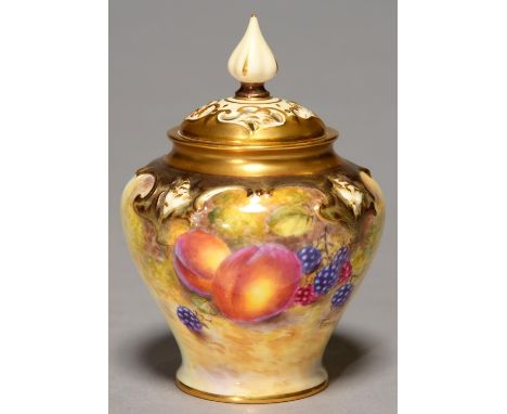 A ROYAL WORCESTER POT POURRI VASE AND COVER, 1956, PAINTED BY FREEMAN, SIGNED, WITH FRUIT BENEATH MOULDED GILT SHOULDER, THE 