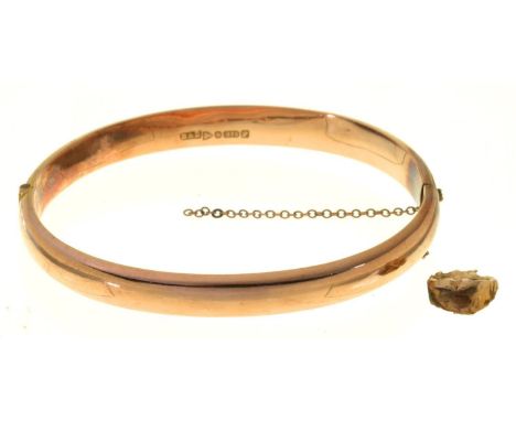 A 9CT GOLD BANGLE, 63 X 58MM, CHESTER 1918, 7.1G AND A SCRAP GOLD DENTAL CROWN (2) Bangle in good condition with light scratc