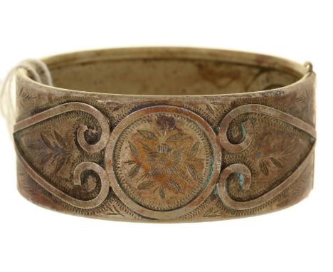 AN UNUSUAL VICTORIAN SILVER PLATED BANGLE, 53 X 64MM, MARKED REGD APRIL 3RD 1882 Much dirt but not dented or otherwise damage