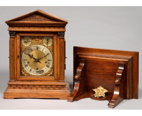 A GERMAN OAK ARCHITECTURAL CASED BRACKET CLOCK AND A BRACKET, LATE 19TH C, HAVING BRASS DIAL WITH MATTED CENTRE, SILVERED CHA