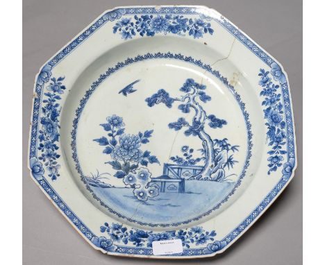 A CHINESE OCTAGONAL BLUE AND WHITE BASIN, 18TH C, PAINTED WITH PINE, TREE PEONY AND FENCE SURROUNDED BY FOUR TRAILING SPRAYS 