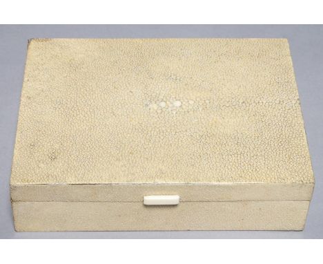 AN ART DECO SHAGREEN CIGARETTE BOX, 1930'S, WITH IVORY THUMBPIECE, LINED IN LIGHT WOOD, 14 X 19CM One or two minute losses to