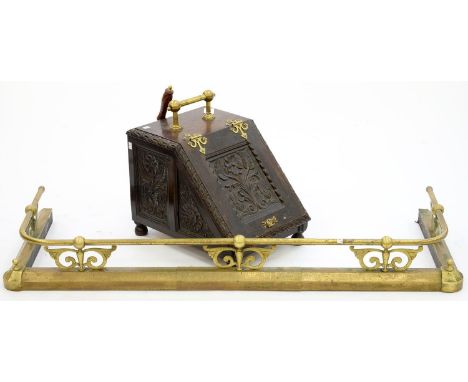 A VICTORIAN CARVED AND PANELLED OAK COAL BOX AND CONTEMPORARY BRASS FENDER, 140CM W; 15CM X 45CM Side panel split on coal box