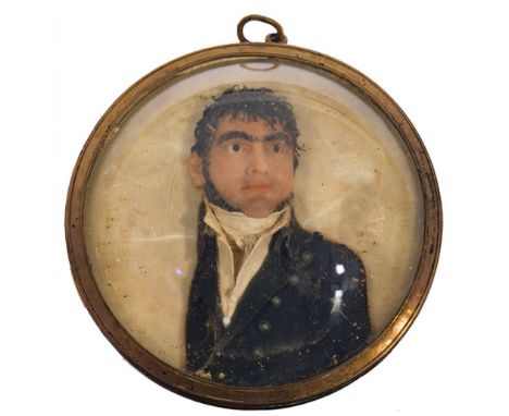 Neapolitan school of ca. 1810."Portrait of a gentleman.Relief in polychrome wax.Bronze frame. Convex glass.Measurements: 7 x 