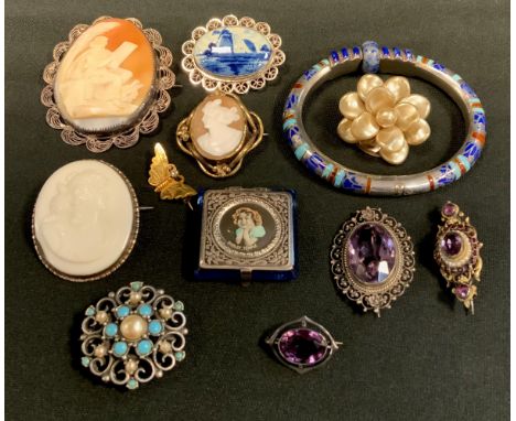 Jewellery  - a middle eastern silver coloured metal hinge bangle, lapis lazuli bead and enamelled decoration,  Victorian Came