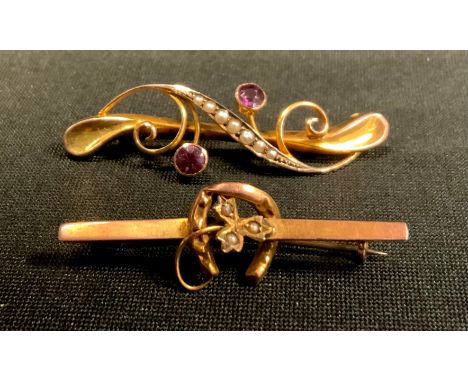 A Victorian seed pearl and pink stone 9ct gold brooch,  another unmarked, 3.1g gross (2) 