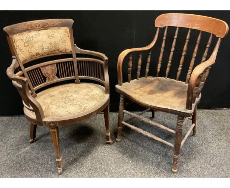 An Edwardian Sheraton Revival mahogany armchair, boxwood and Kingwood inlay, oval seat, tapered square legs, ceramic casters,