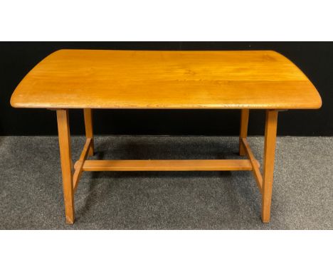 An Ercol, ‘Blonde’ Elm, mid century trestle dining table, rounded rectangular top, 74cm high x 137cm long x 68.5cm wide. 