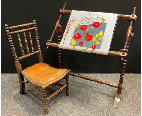 A late 19th century oak bobbin turned nursing chair, studded leather seat, shaped and turned body, 82cm high, 20cm wide;  a f