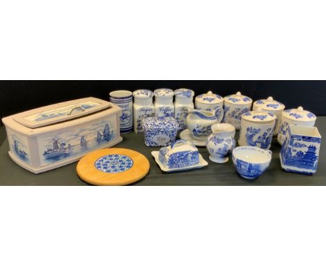 Blue and white - five large blue and white kitchen jars, large Spode cup, butter dish, ceramic panelled bread bin; etc 